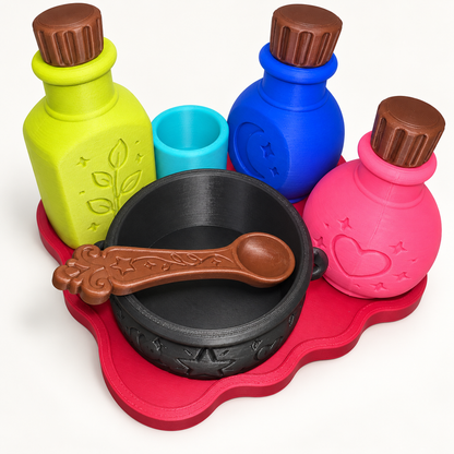 Elevated view of Potion Play Set showing the cauldron and decorative brown spoon on a white background