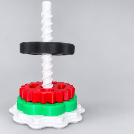 Spin & Stack Tower with colorful rings on a clean neutral background